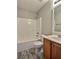 Bathroom featuring a bathtub, shower, and a wooden vanity at 7603 Autumn Breeze, Douglasville, GA 30134