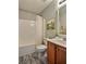 Traditional bathroom includes a bathtub and wooden vanity at 7603 Autumn Breeze, Douglasville, GA 30134