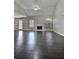 Bright living room with a fireplace, hardwood floors, and high ceilings at 7603 Autumn Breeze, Douglasville, GA 30134