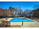 Inviting splash pad area featuring colorful water sprays and shaded seating, perfect for warm weather fun at 9625 River Lake Dr, Roswell, GA 30075