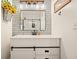 Beautiful bathroom with a modern vanity, subway tile and rustic wood and metal light fixture at 1251 Oakdale Rd, Canton, GA 30114