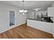 Bright eat-in kitchen with stainless steel appliances, an island and easy access to an outdoor space at 1835 Big Haynes Ct, Grayson, GA 30017