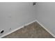 Laundry area with tile floors, electrical outlet and utility hookups at 1835 Big Haynes Ct, Grayson, GA 30017