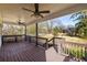 Spacious covered back porch with ceiling fans, ideal for outdoor living and entertaining Gathering and friends at 624 3Rd Ave, Decatur, GA 30030