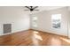 Bright bedroom with hardwood floors, two windows, and ample natural light at 624 3Rd Ave, Decatur, GA 30030