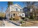 Charming two-story home with white siding, a front porch, and landscaped yard at 624 3Rd Ave, Decatur, GA 30030