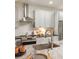 Close-up of a modern kitchen with stainless steel appliances and white subway tile backsplash at 624 3Rd Ave, Decatur, GA 30030