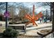 Town Square with modern art installation, benches, streetlights, and commercial buildings at 624 3Rd Ave, Decatur, GA 30030