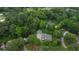 Aerial view of a home and a canopy of mature trees at 716 Counsel Ne Dr, Marietta, GA 30068