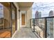 Balcony featuring glass railings and skyline views, connecting the indoor and outdoor spaces beautifully at 1280 W Peachtree St Nw # 3208, Atlanta, GA 30309