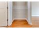 Empty closet with hardwood floors and a wire shelf at 1280 W Peachtree St Nw # 3208, Atlanta, GA 30309