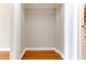 Empty walk-in closet with hardwood floor and wire shelving perfect for organizing belongings at 1280 W Peachtree St Nw # 3208, Atlanta, GA 30309