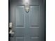 Stylish blue front door featuring a digital lock, peephole, and elegant knocker at 1280 W Peachtree St Nw # 3208, Atlanta, GA 30309