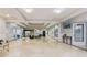 Spacious and well-lit lobby with polished floors and seating area at 1280 W Peachtree St Nw # 3208, Atlanta, GA 30309