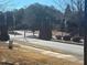 Community gate, showing the secure entrance to the neighborhood at 3311 Lindenridge Dr, Buford, GA 30519