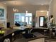 Modern kitchen with sleek countertops, pendant lighting, and a view into the living space at 3311 Lindenridge Dr, Buford, GA 30519