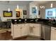 Modern kitchen featuring granite countertops, white cabinets, and stainless steel appliances at 3311 Lindenridge Dr, Buford, GA 30519