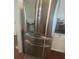 Stainless steel refrigerator with ice maker and a four-door design in a kitchen at 3311 Lindenridge Dr, Buford, GA 30519