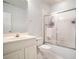 A functional bathroom is equipped with a vanity and a shower-tub, simple and efficient at 3740 Cannonwolde Dr, Snellville, GA 30039