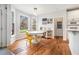 Cozy breakfast nook with hardwood floors, natural light, and a view of the backyard at 3740 Cannonwolde Dr, Snellville, GA 30039