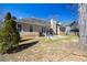 Rear view of home showcasing siding, patio, and well-maintained landscaping at 6272 Cheatham Lake Nw Dr, Acworth, GA 30101