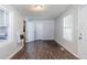 Inviting living room with wood flooring and natural light at 8523 Duncan St, Douglasville, GA 30134