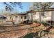 Spacious backyard with a brick facade and well-maintained landscaping, perfect for outdoor enjoyment at 123 Creek Cir, Stockbridge, GA 30281