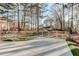 Fenced-in backyard featuring a concrete patio, ideal for outdoor entertaining at 123 Creek Cir, Stockbridge, GA 30281