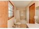 Classic bathroom with a shower-tub combo, a standard toilet, and a neutral color scheme at 123 Creek Cir, Stockbridge, GA 30281