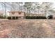 A charming brick home with manicured landscaping and a well-maintained front yard at 123 Creek Cir, Stockbridge, GA 30281