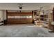 Spacious garage with storage shelving and a large door, providing secure parking at 123 Creek Cir, Stockbridge, GA 30281