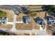 Aerial view of house on cul-de-sac with long driveway and gray roof at 17 Denny Springs Dr, Dallas, GA 30157