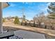 Wide backyard with partial fence, young trees, and clear blue sky at 17 Denny Springs Dr, Dallas, GA 30157