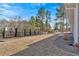 Spacious, level backyard, with partial fence and mature trees at 17 Denny Springs Dr, Dallas, GA 30157