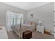 Bedroom with large window and white furnishings at 17 Denny Springs Dr, Dallas, GA 30157