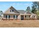 Charming single Gathering home with horizontal siding and traditional design elements at 17 Denny Springs Dr, Dallas, GA 30157