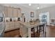 Bright kitchen with stainless steel appliances, a large island, and hardwood floors at 17 Denny Springs Dr, Dallas, GA 30157