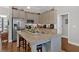 Modern kitchen with stainless steel appliances, an island with a sink, and ample storage space at 17 Denny Springs Dr, Dallas, GA 30157