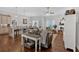 Inviting living room with hardwood floors, a gray leather sofa, fireplace, and a large built-in cabinet at 17 Denny Springs Dr, Dallas, GA 30157