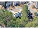 Aerial view of a home surrounded by lush trees at 4014 Ironhill Ln, Woodstock, GA 30189