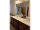 Bright bathroom features double sinks, soaking tub, and separate glass-enclosed shower at 1366 Image Xing, Lawrenceville, GA 30045