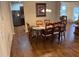 Dining room boasts hardwood floors and neutral walls at 1366 Image Xing, Lawrenceville, GA 30045