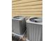 Two outdoor AC units for the home's HVAC system at 1366 Image Xing, Lawrenceville, GA 30045