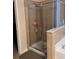 This shower features a glass enclosure and tiled walls at 1366 Image Xing, Lawrenceville, GA 30045