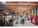 Unfinished basement features exposed ceiling, workbench, and ample space for storage and creative projects at 139 Stargaze Rdg, Canton, GA 30114