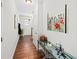 Clean hallway featuring hardwood floors, light gray walls, and decorative accents, creating a welcoming entrance space at 139 Stargaze Rdg, Canton, GA 30114