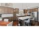 Stylish kitchen with modern cabinets, an island with barstool seating, and stainless steel appliances at 139 Stargaze Rdg, Canton, GA 30114