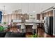 Bright kitchen with an island, stainless steel appliances, white countertops, and hardwood floors at 139 Stargaze Rdg, Canton, GA 30114