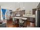 Eat-in kitchen featuring a dining table, kitchen island, and built in pantry at 139 Stargaze Rdg, Canton, GA 30114