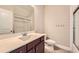 A clean, bright bathroom with a walk-in shower featuring white subway tile and glass door at 2998 Octavia Cir, Marietta, GA 30062